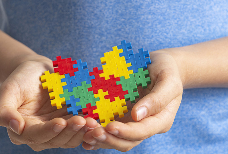 Puzzle pieces in heart shape for Autism Awareness Month