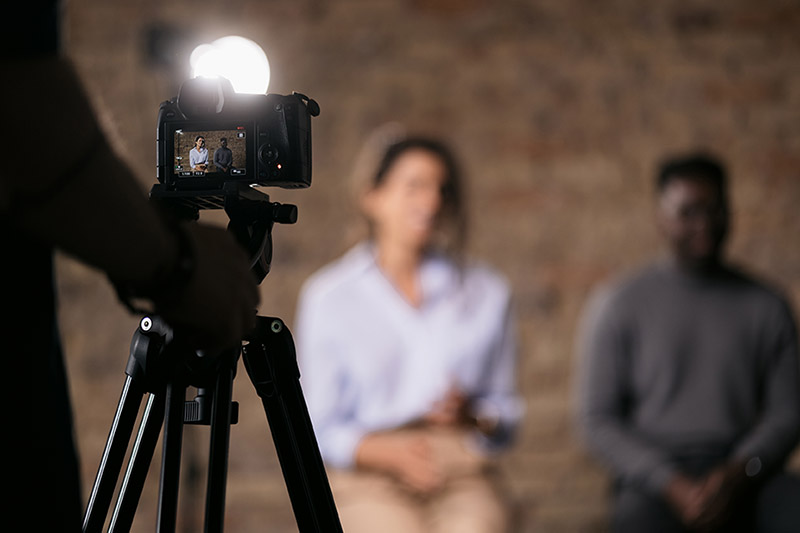 video camera shooting interviews