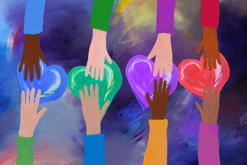 Hands giving and receiving colorful hearts.